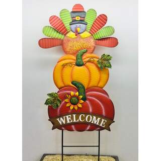 46”x21” Turkey on top of pumpkins on two poles
